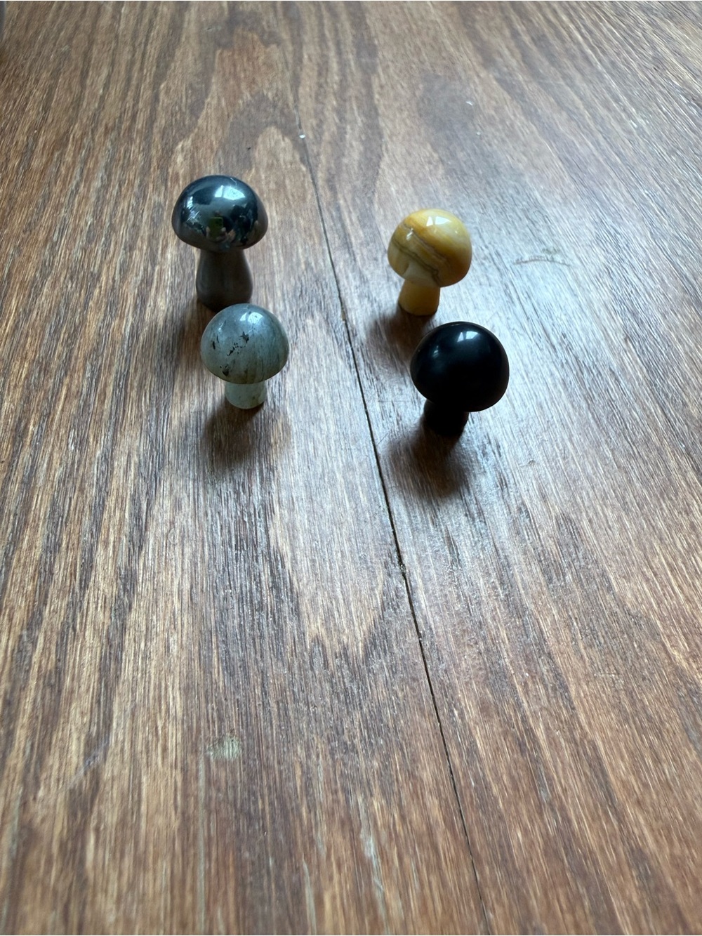 Set of 4 small mushroom crystal carvings